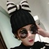 CHIC BLACK AND WHITE STRIPE PATTERN BOWKNOT DECORATED KNITTED HAT FOR WOMEN (COLOR ASSORTE