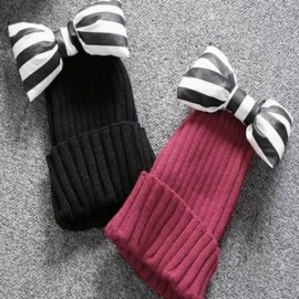 CHIC BLACK AND WHITE STRIPE PATTERN BOWKNOT DECORATED KNITTED HAT FOR WOMEN (COLOR ASSORTE